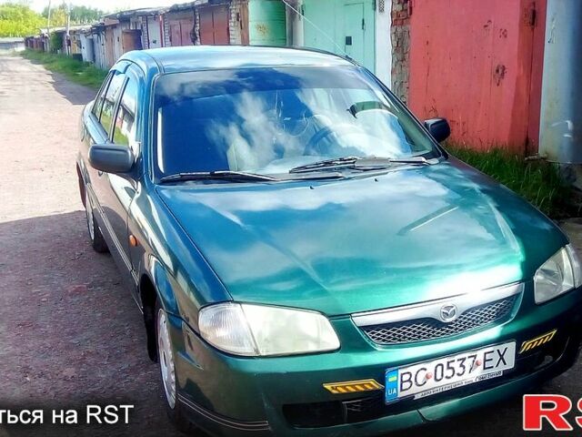 Зеленый Мазда 323, объемом двигателя 1.5 л и пробегом 237 тыс. км за 2500 $, фото 1 на Automoto.ua