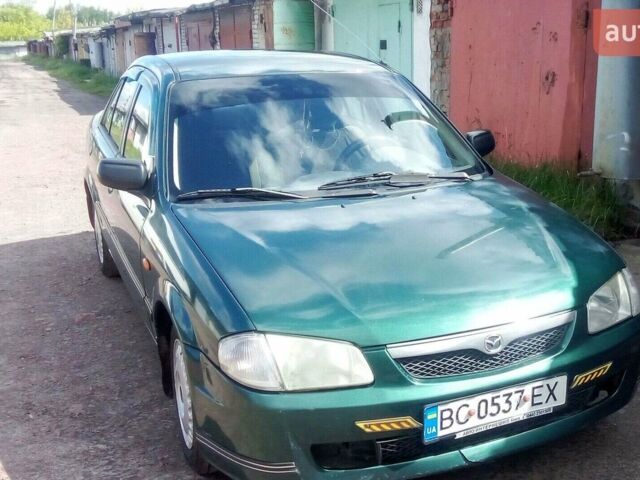 Зелений Мазда 323, об'ємом двигуна 1.5 л та пробігом 237 тис. км за 2500 $, фото 1 на Automoto.ua