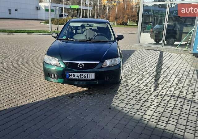 Зелений Мазда 323, об'ємом двигуна 1.3 л та пробігом 167 тис. км за 3473 $, фото 1 на Automoto.ua