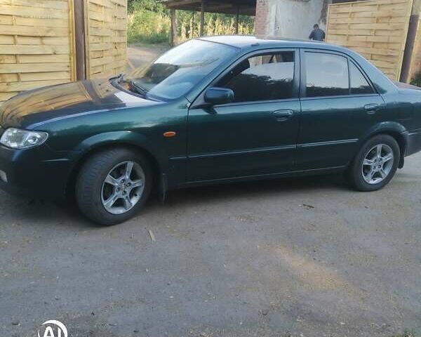 Зелений Мазда 323, об'ємом двигуна 1.6 л та пробігом 278 тис. км за 2700 $, фото 1 на Automoto.ua