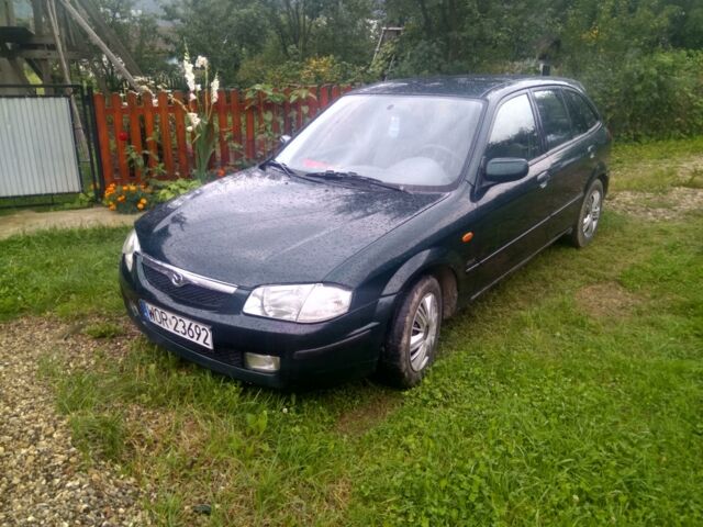 Зелений Мазда 323, об'ємом двигуна 2 л та пробігом 2 тис. км за 1350 $, фото 1 на Automoto.ua