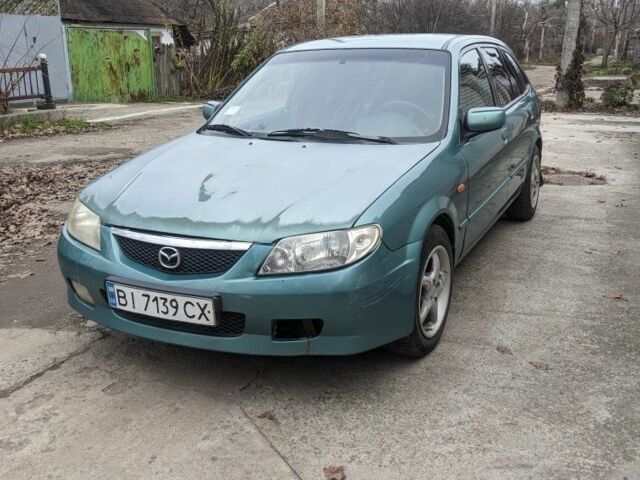 Зеленый Мазда 323, объемом двигателя 1.6 л и пробегом 289 тыс. км за 1999 $, фото 1 на Automoto.ua