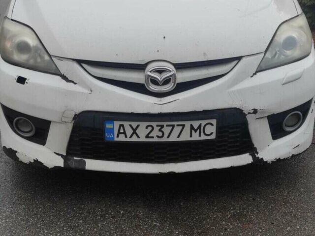 Белый Мазда 5, объемом двигателя 2 л и пробегом 247 тыс. км за 6000 $, фото 1 на Automoto.ua