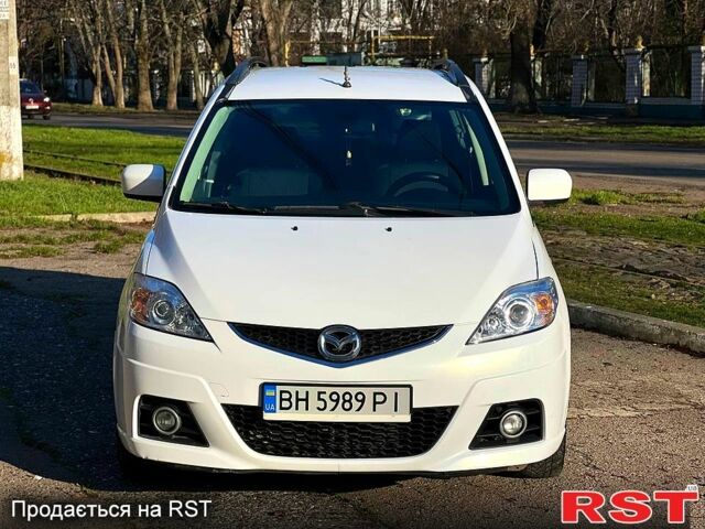 Белый Мазда 5, объемом двигателя 2 л и пробегом 177 тыс. км за 5999 $, фото 1 на Automoto.ua
