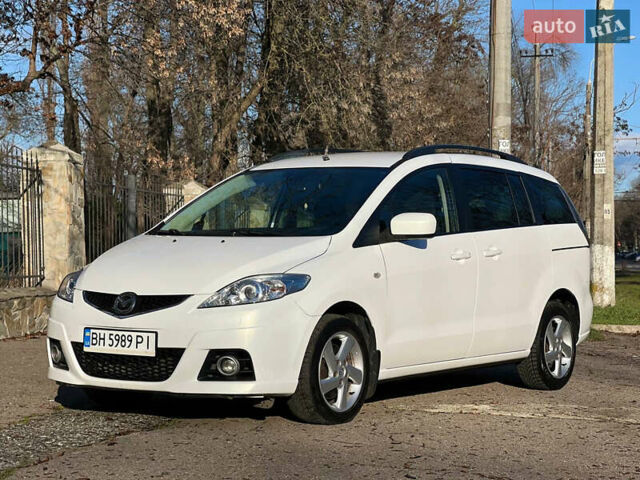 Белый Мазда 5, объемом двигателя 2 л и пробегом 177 тыс. км за 5999 $, фото 1 на Automoto.ua