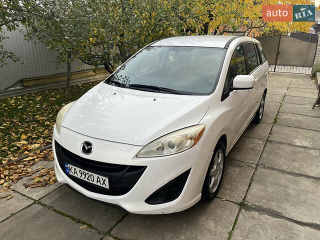 Белый Мазда 5, объемом двигателя 2.5 л и пробегом 170 тыс. км за 6500 $, фото 1 на Automoto.ua
