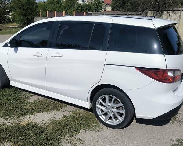 Белый Мазда 5, объемом двигателя 2.5 л и пробегом 194 тыс. км за 9000 $, фото 1 на Automoto.ua
