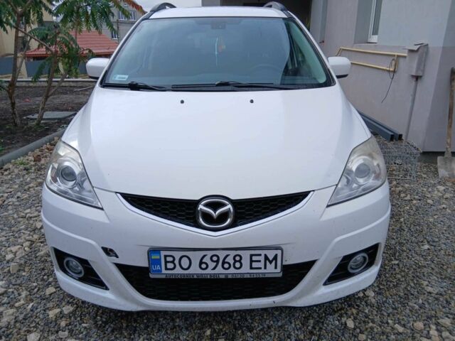 Белый Мазда 5, объемом двигателя 2 л и пробегом 277 тыс. км за 5900 $, фото 1 на Automoto.ua