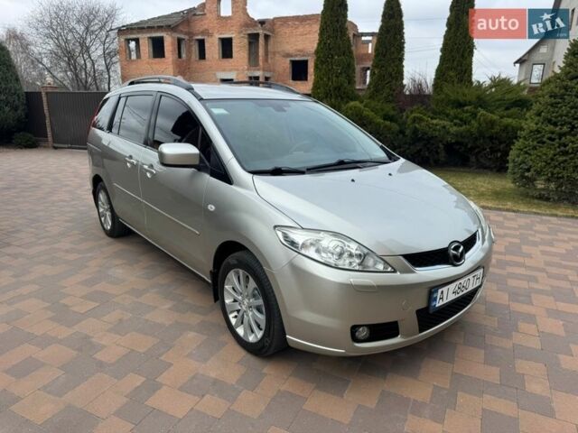 Бежевый Мазда 5, объемом двигателя 2 л и пробегом 240 тыс. км за 4950 $, фото 1 на Automoto.ua
