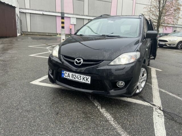 Черный Мазда 5, объемом двигателя 2 л и пробегом 235 тыс. км за 4096 $, фото 1 на Automoto.ua
