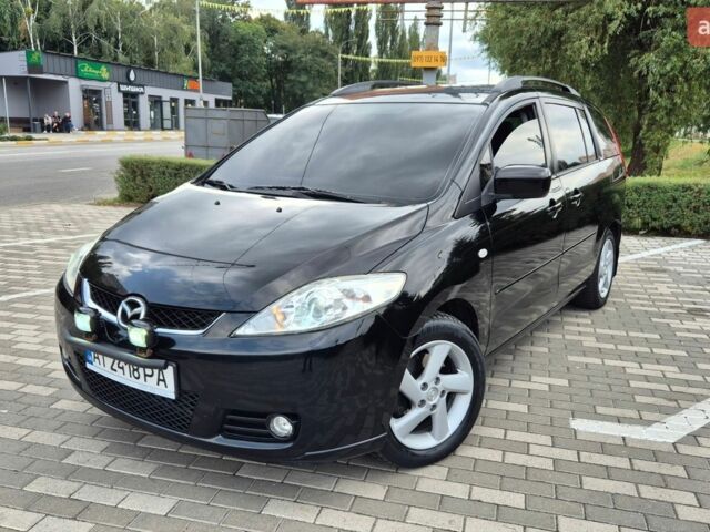 Черный Мазда 5, объемом двигателя 2 л и пробегом 267 тыс. км за 5500 $, фото 1 на Automoto.ua