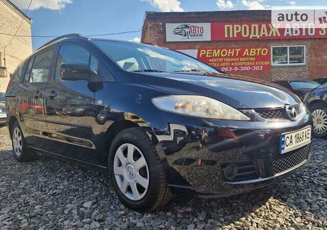 Черный Мазда 5, объемом двигателя 1.8 л и пробегом 241 тыс. км за 5350 $, фото 1 на Automoto.ua