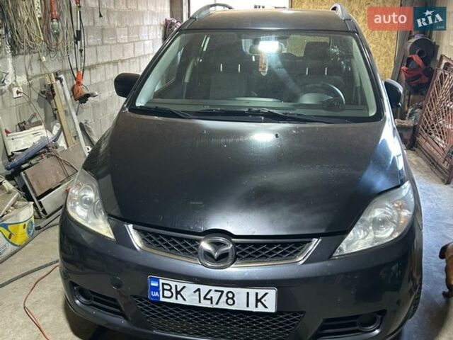 Черный Мазда 5, объемом двигателя 2 л и пробегом 310 тыс. км за 4300 $, фото 1 на Automoto.ua