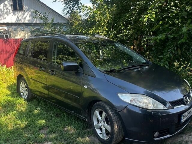 Чорний Мазда 5, об'ємом двигуна 2 л та пробігом 316 тис. км за 4700 $, фото 1 на Automoto.ua