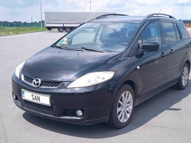 Черный Мазда 5, объемом двигателя 2 л и пробегом 285 тыс. км за 4300 $, фото 1 на Automoto.ua