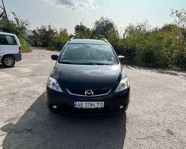 Черный Мазда 5, объемом двигателя 2 л и пробегом 275 тыс. км за 5350 $, фото 1 на Automoto.ua