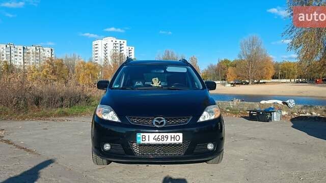 Черный Мазда 5, объемом двигателя 2 л и пробегом 218 тыс. км за 5200 $, фото 1 на Automoto.ua