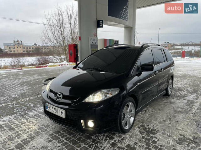 Черный Мазда 5, объемом двигателя 2 л и пробегом 325 тыс. км за 4800 $, фото 1 на Automoto.ua