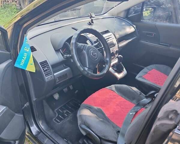 Черный Мазда 5, объемом двигателя 1.8 л и пробегом 320 тыс. км за 4000 $, фото 1 на Automoto.ua