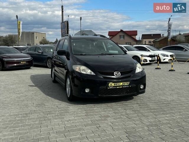 Черный Мазда 5, объемом двигателя 2 л и пробегом 218 тыс. км за 4300 $, фото 1 на Automoto.ua