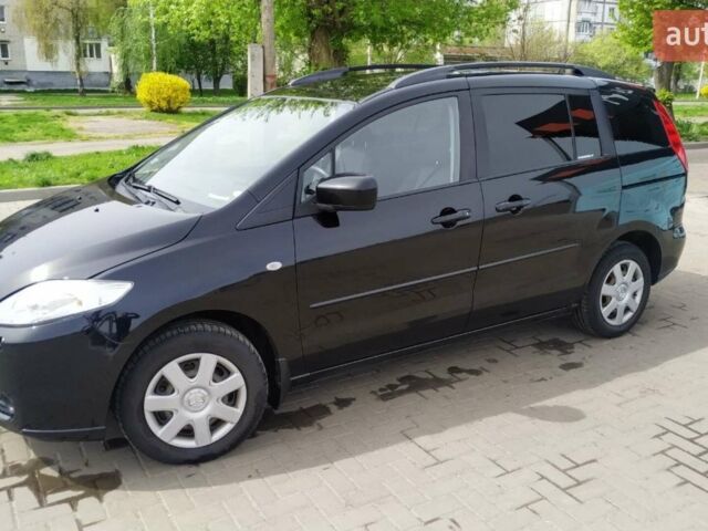 Черный Мазда 5, объемом двигателя 2 л и пробегом 260 тыс. км за 5900 $, фото 1 на Automoto.ua