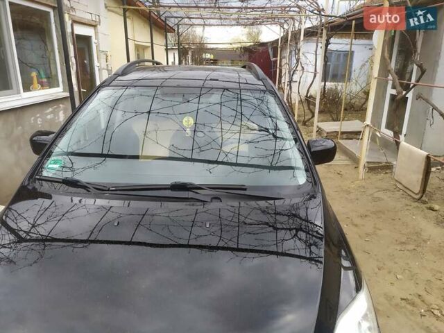 Черный Мазда 5, объемом двигателя 1.8 л и пробегом 180 тыс. км за 5200 $, фото 1 на Automoto.ua