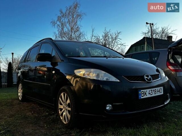 Черный Мазда 5, объемом двигателя 2 л и пробегом 280 тыс. км за 4500 $, фото 1 на Automoto.ua