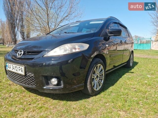 Черный Мазда 5, объемом двигателя 2 л и пробегом 220 тыс. км за 6000 $, фото 1 на Automoto.ua