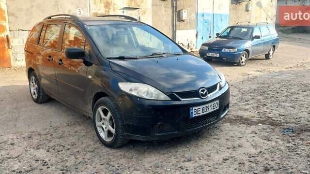 Черный Мазда 5, объемом двигателя 2 л и пробегом 300 тыс. км за 3000 $, фото 1 на Automoto.ua