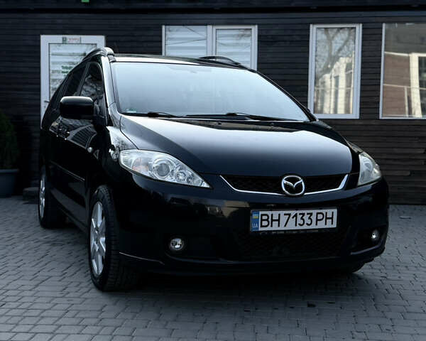 Черный Мазда 5, объемом двигателя 2 л и пробегом 246 тыс. км за 5600 $, фото 1 на Automoto.ua