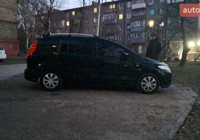 Черный Мазда 5, объемом двигателя 1.79 л и пробегом 264 тыс. км за 5300 $, фото 1 на Automoto.ua
