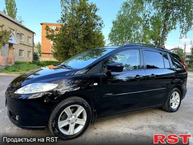 Черный Мазда 5, объемом двигателя 1.8 л и пробегом 200 тыс. км за 5500 $, фото 1 на Automoto.ua