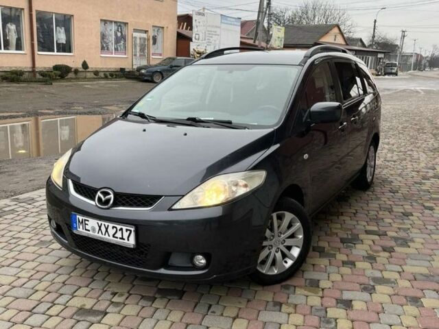 Черный Мазда 5, объемом двигателя 2 л и пробегом 280 тыс. км за 2550 $, фото 1 на Automoto.ua