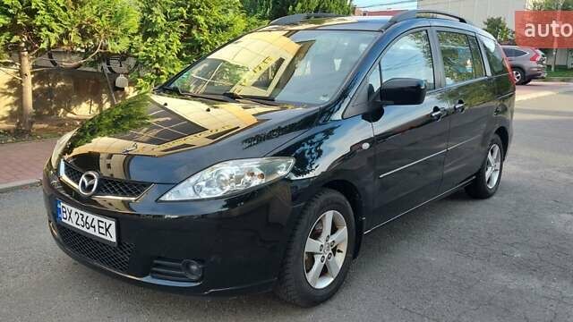 Черный Мазда 5, объемом двигателя 1.8 л и пробегом 240 тыс. км за 5500 $, фото 1 на Automoto.ua