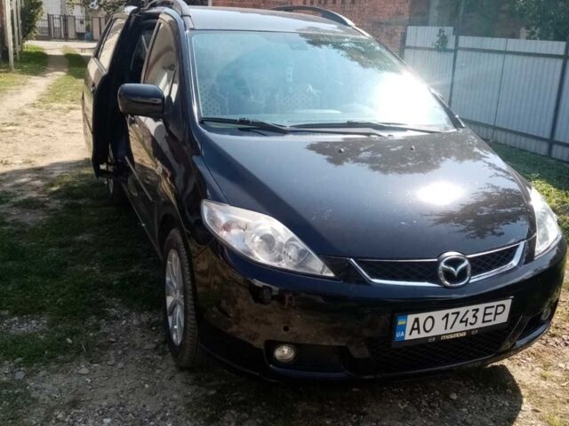 Черный Мазда 5, объемом двигателя 2 л и пробегом 310 тыс. км за 4699 $, фото 1 на Automoto.ua