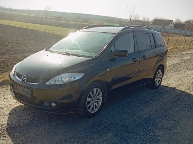 Черный Мазда 5, объемом двигателя 2 л и пробегом 280 тыс. км за 4400 $, фото 1 на Automoto.ua