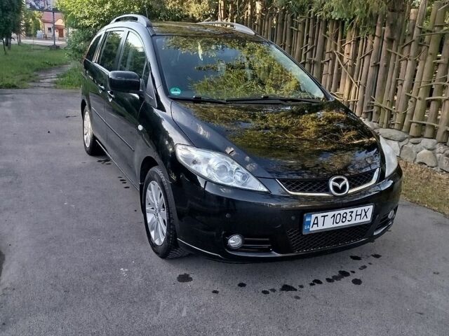 Черный Мазда 5, объемом двигателя 1.8 л и пробегом 318 тыс. км за 4350 $, фото 1 на Automoto.ua