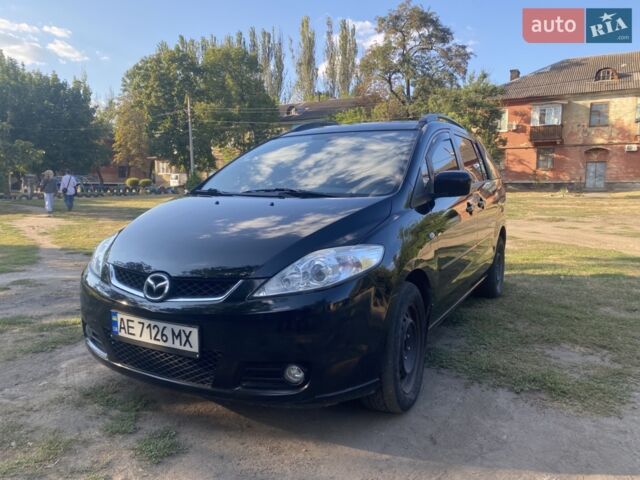Черный Мазда 5, объемом двигателя 2 л и пробегом 300 тыс. км за 4500 $, фото 1 на Automoto.ua