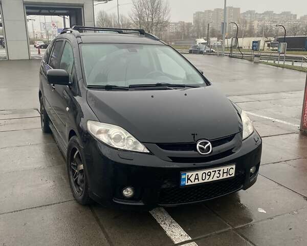 Черный Мазда 5, объемом двигателя 2 л и пробегом 450 тыс. км за 5500 $, фото 1 на Automoto.ua
