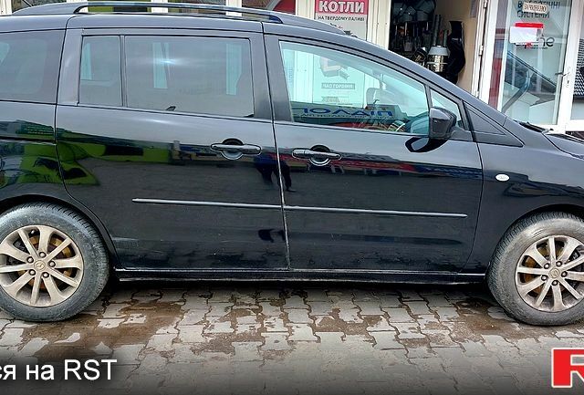 Черный Мазда 5, объемом двигателя 2 л и пробегом 350 тыс. км за 5000 $, фото 1 на Automoto.ua