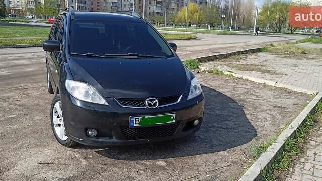 Черный Мазда 5, объемом двигателя 2 л и пробегом 298 тыс. км за 7000 $, фото 1 на Automoto.ua
