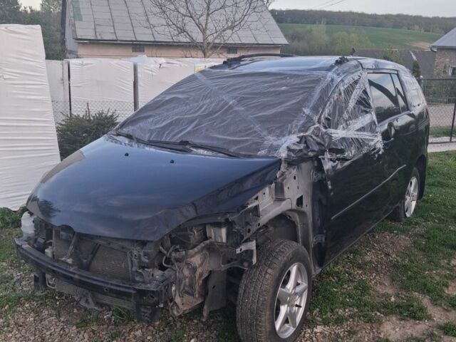 Чорний Мазда 5, об'ємом двигуна 2 л та пробігом 310 тис. км за 2500 $, фото 1 на Automoto.ua