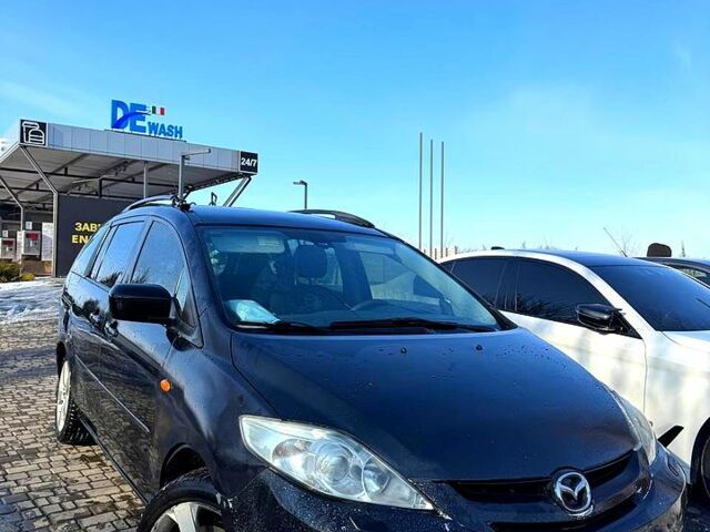 Черный Мазда 5, объемом двигателя 2 л и пробегом 260 тыс. км за 3400 $, фото 1 на Automoto.ua