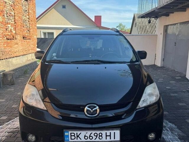 Черный Мазда 5, объемом двигателя 2 л и пробегом 273 тыс. км за 4300 $, фото 1 на Automoto.ua