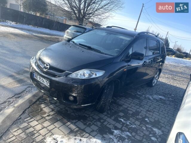 Черный Мазда 5, объемом двигателя 2 л и пробегом 255 тыс. км за 3200 $, фото 1 на Automoto.ua
