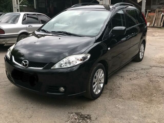 Черный Мазда 5, объемом двигателя 2 л и пробегом 200 тыс. км за 8600 $, фото 1 на Automoto.ua