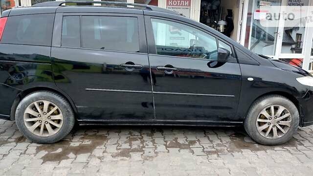 Черный Мазда 5, объемом двигателя 2 л и пробегом 360 тыс. км за 4700 $, фото 1 на Automoto.ua