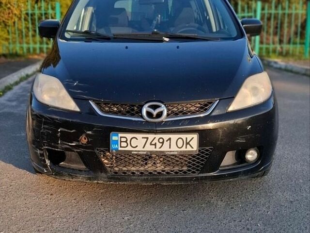 Черный Мазда 5, объемом двигателя 2 л и пробегом 346 тыс. км за 3800 $, фото 1 на Automoto.ua