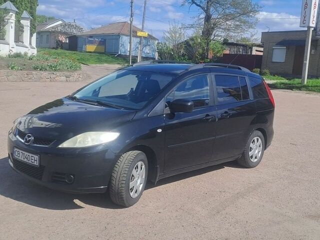 Черный Мазда 5, объемом двигателя 2 л и пробегом 290 тыс. км за 3500 $, фото 1 на Automoto.ua
