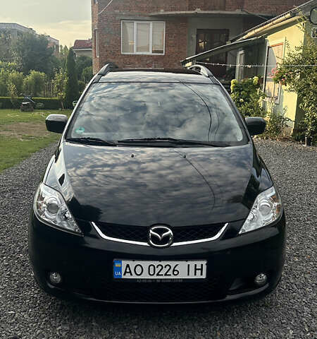 Черный Мазда 5, объемом двигателя 2 л и пробегом 221 тыс. км за 6800 $, фото 1 на Automoto.ua